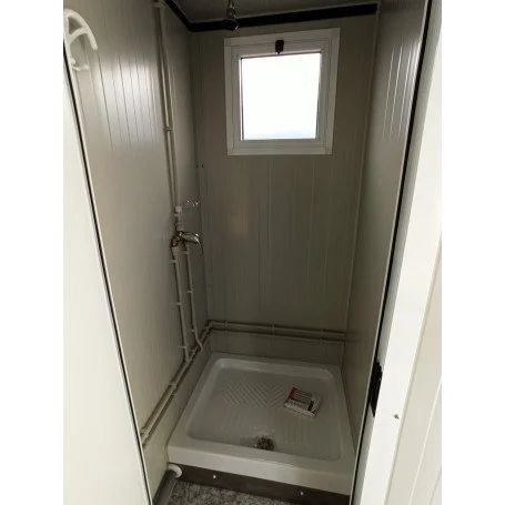 Sanitario SDU con WC, ducha, lavabo y urinario - Imagen 9